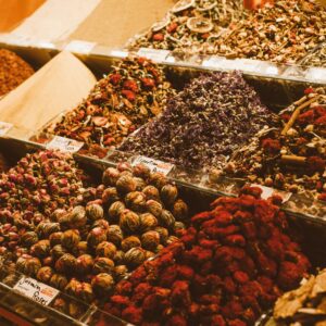 Containers Full of Spices on a Market Stall 